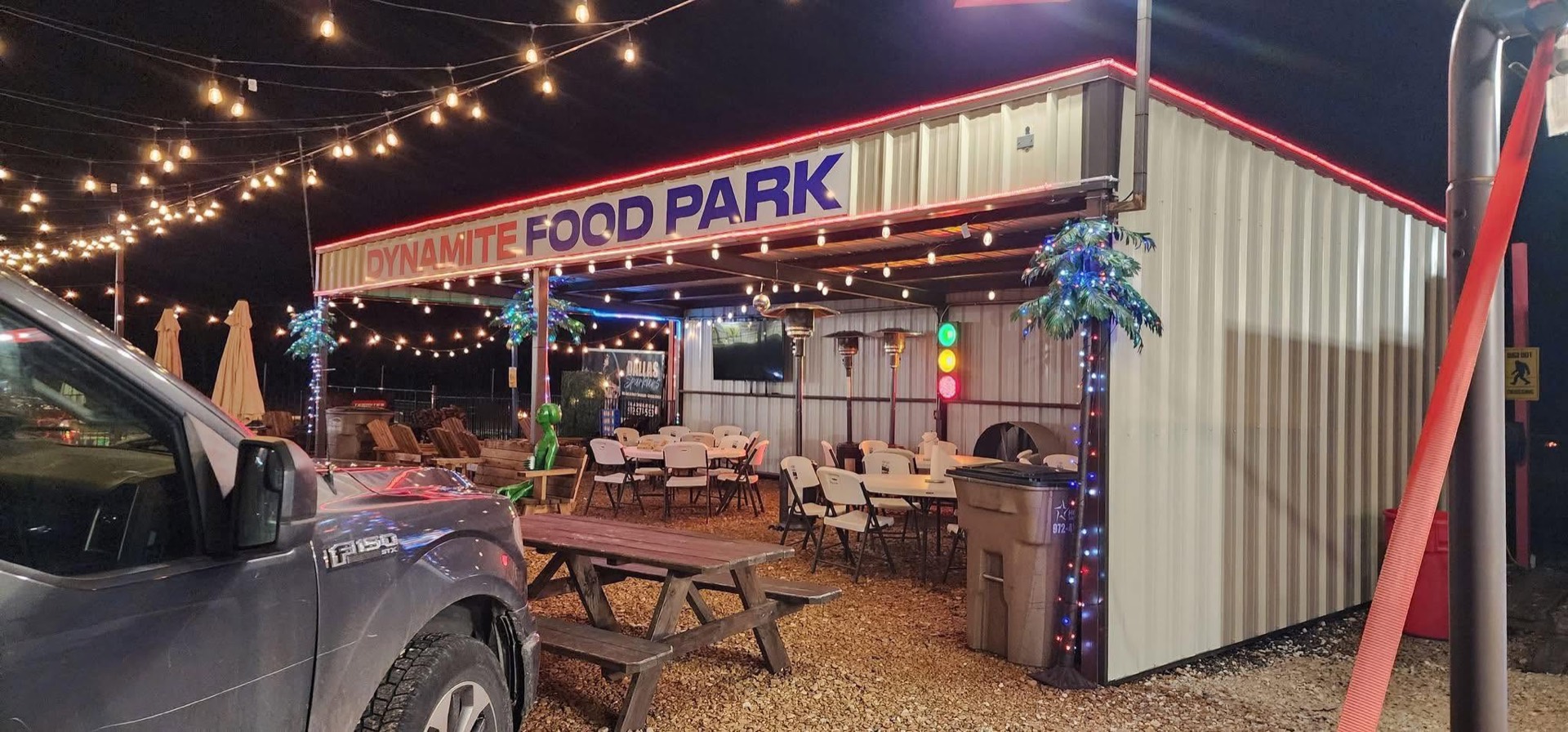 Dynamite Food Park lit up at night
